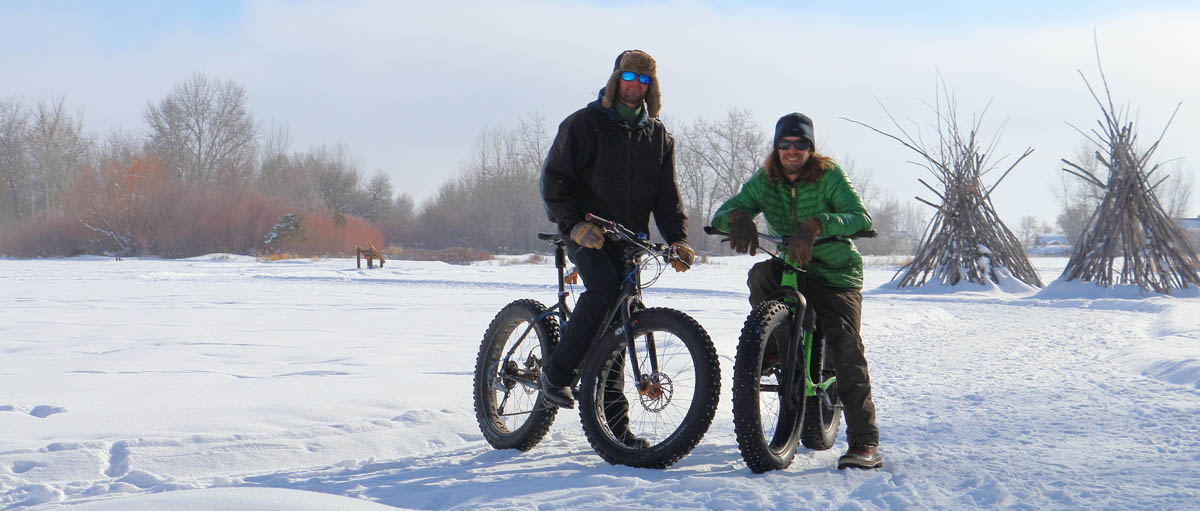 fat tire bicycle riders on snowy trail